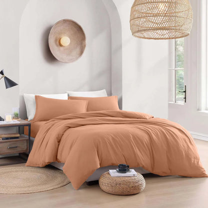 Bedroom with brown bedding and wicker decor