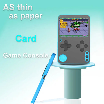Small game console with screen displaying a game, placed on a stand against a light blue background.