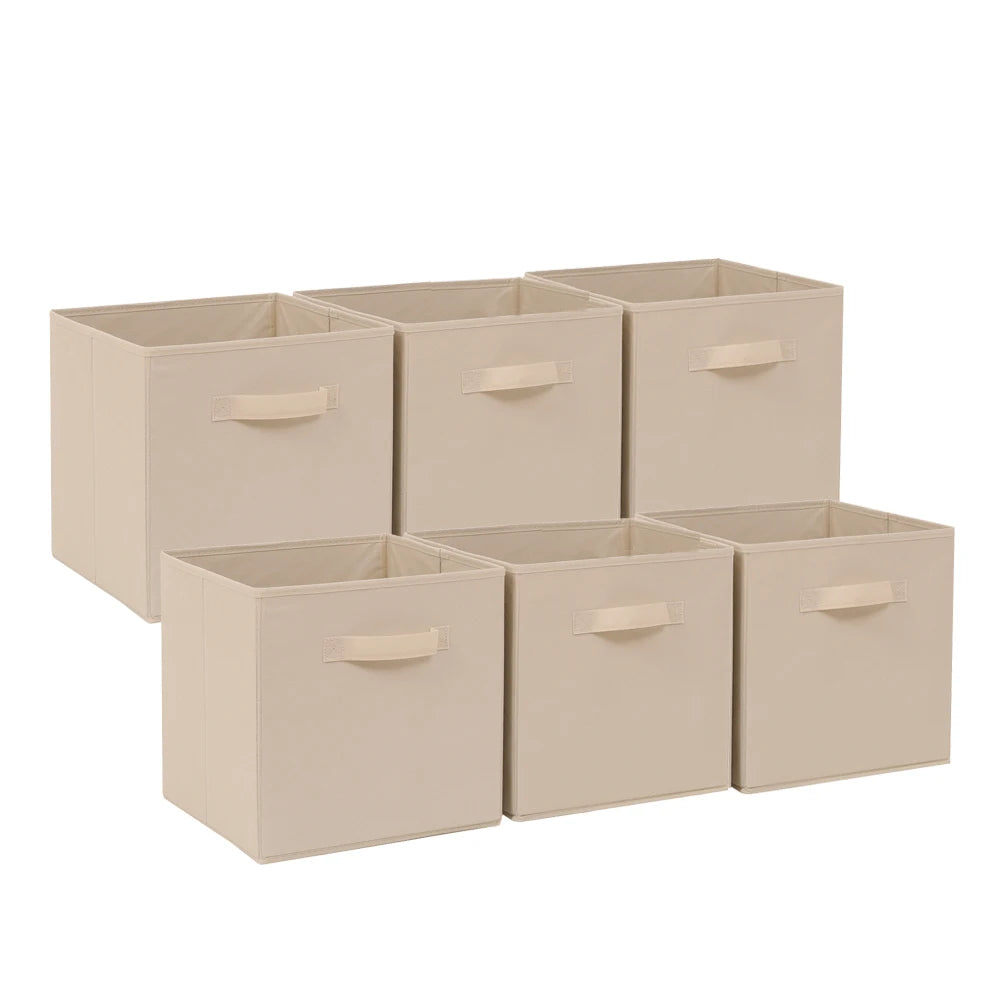Set of six beige storage cubes with handles on a white background