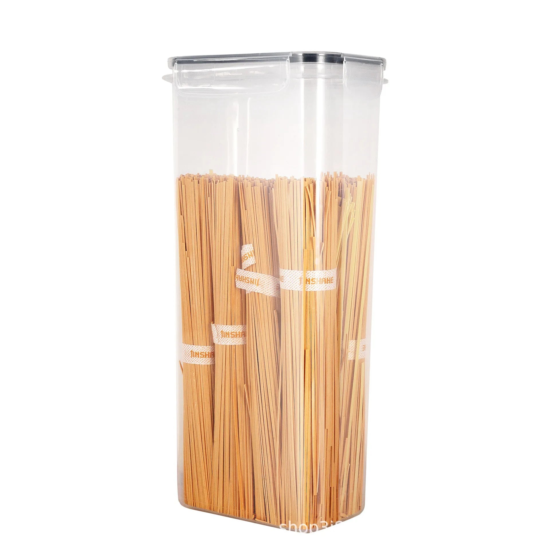 Clear container with spaghetti inside on a white background