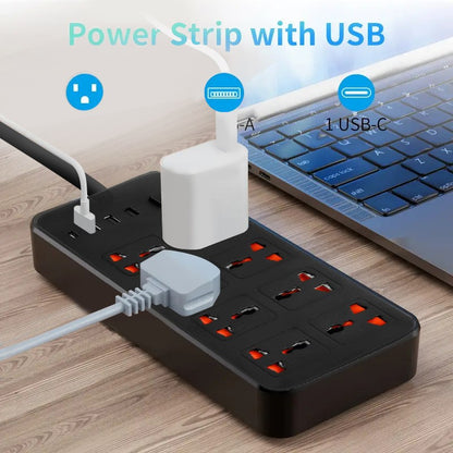 Power strip with USB ports on a wooden surface next to a laptop.