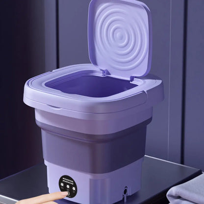 Purple portable toilet with open lid on a dark background