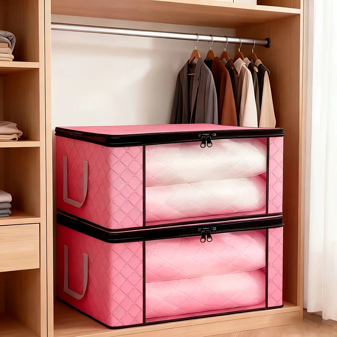 Pink storage box with quilted design in a wardrobe setting