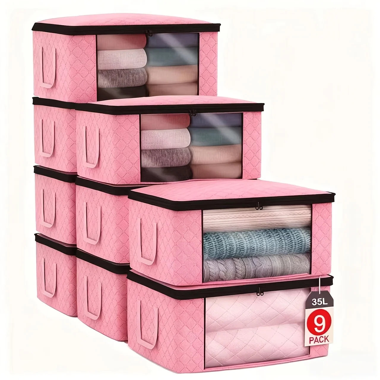 Set of pink storage boxes with quilted design and transparent lid, filled with folded clothes on a white background.