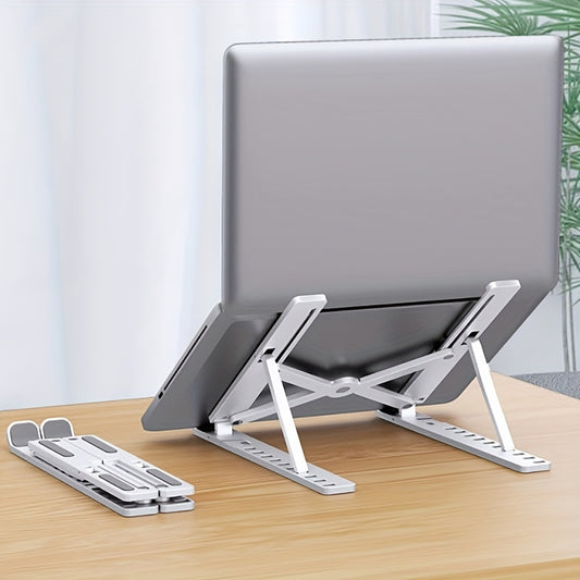 Laptop on a adjustable stand with a neutral background