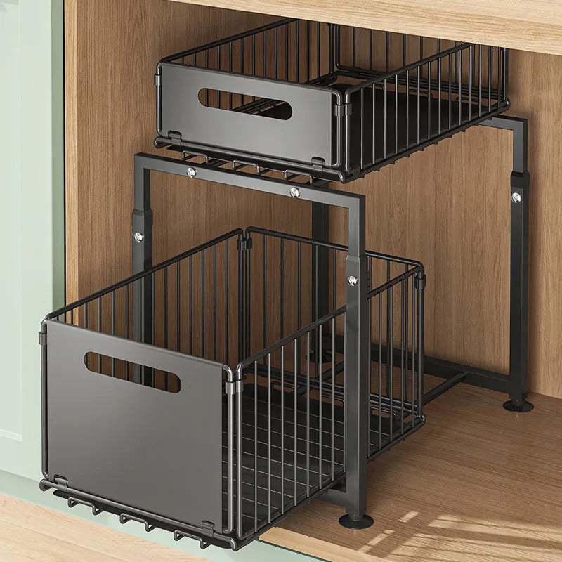 Black metal pull-out storage baskets in a wooden cabinet