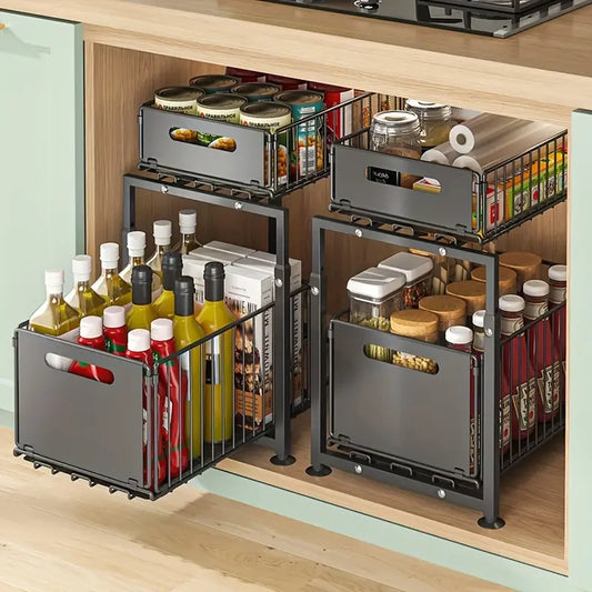 Kitchen cabinet with organized storage baskets containing food items.