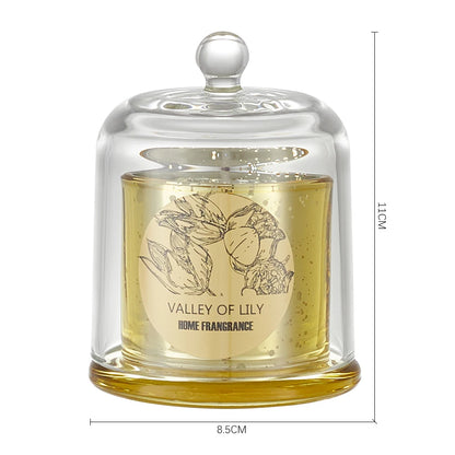 Glass candle with 'Valley of Lily' label and dimensions on a white background