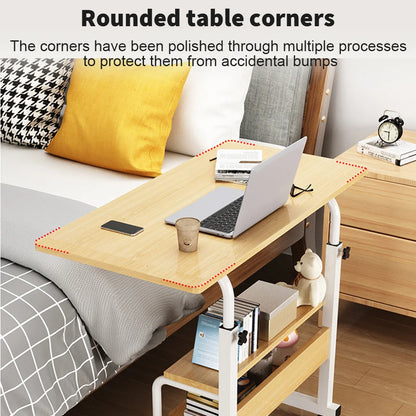 Wooden desk with rounded corners in a bedroom setting, featuring a laptop and other items.