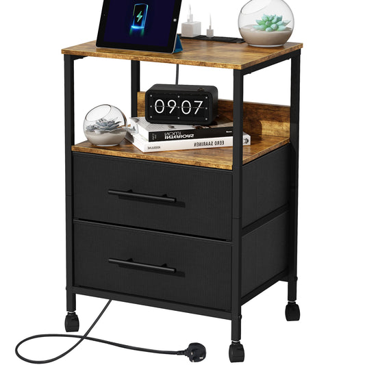 Black metal nightstand with wooden top featuring a tablet, alarm clock, and books.