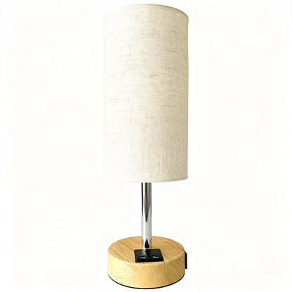 Table lamp with wooden base and beige fabric shade on a white background