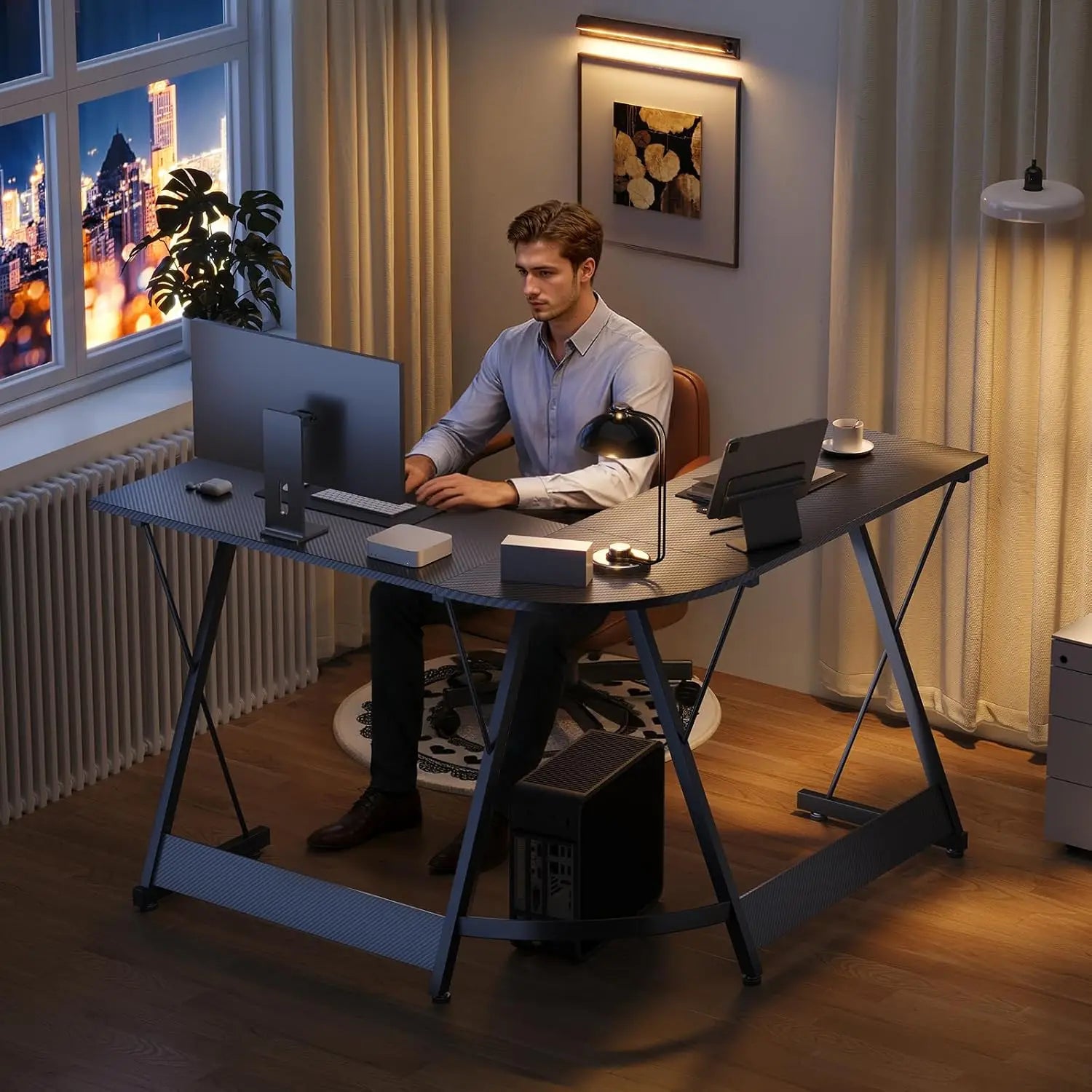 Man working at a desk in a home office with cityscape view