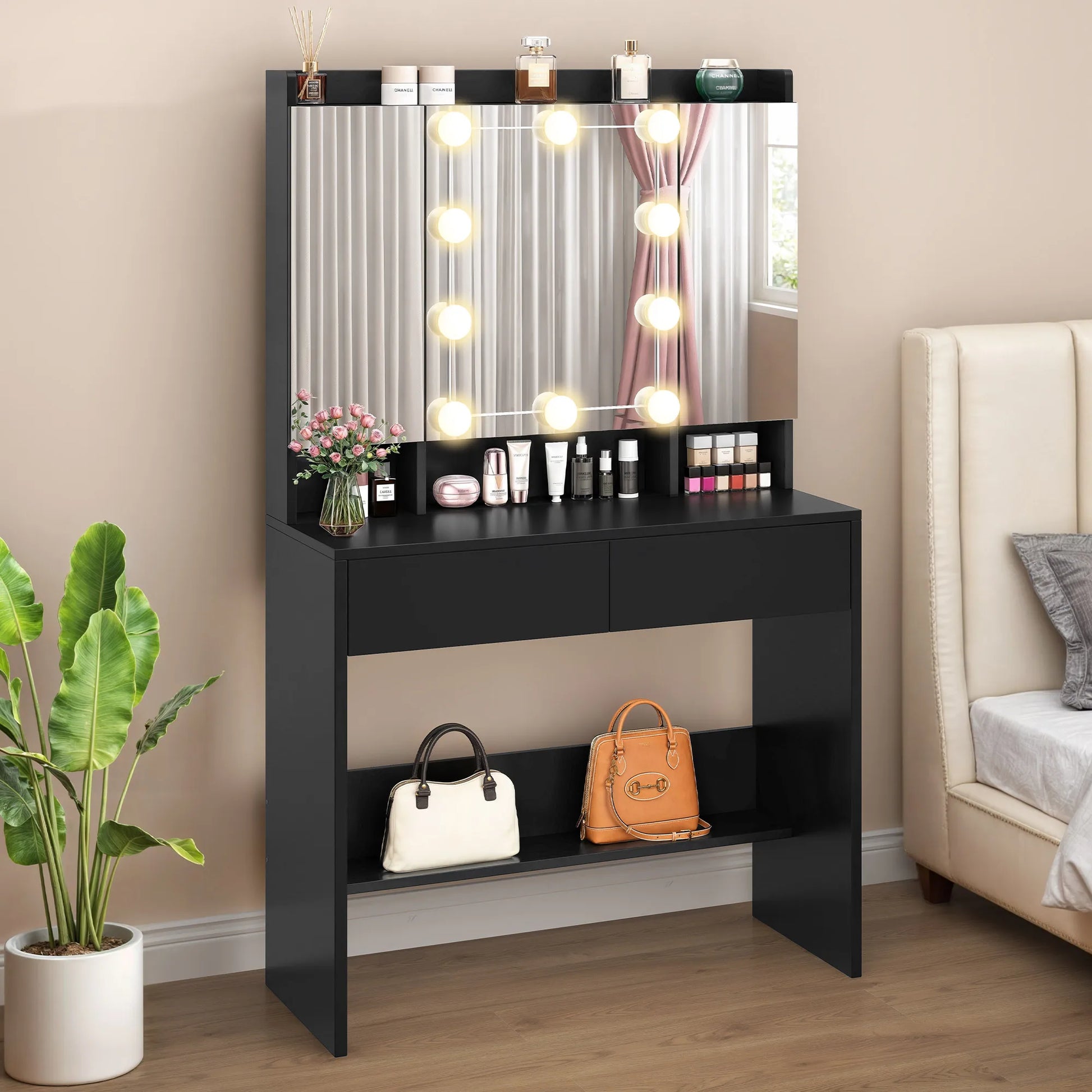 Black vanity table with mirror and lights in a room setting.
