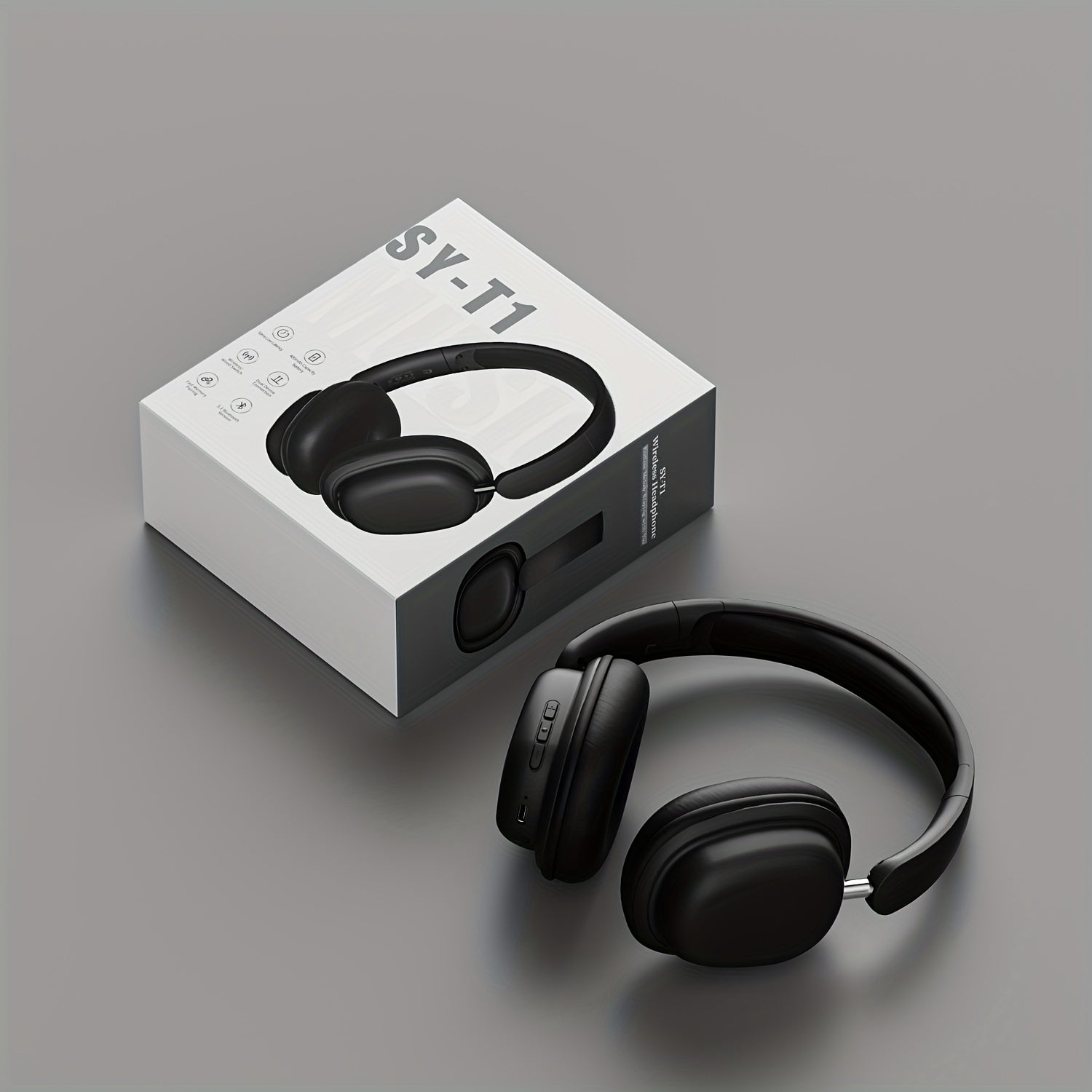 Black headphones with SY-T1 packaging on a gray background