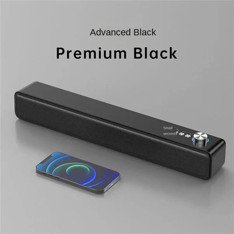 Black soundbar with smartphone on a gray background, labeled 'Advanced Black Premium Black'.