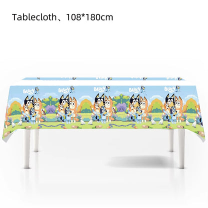 A rectangular tablecloth with a colorful cartoon dog pattern, shown draped over a table on a white background. Text at the top reads 'Tablecloth、108*180cm'.