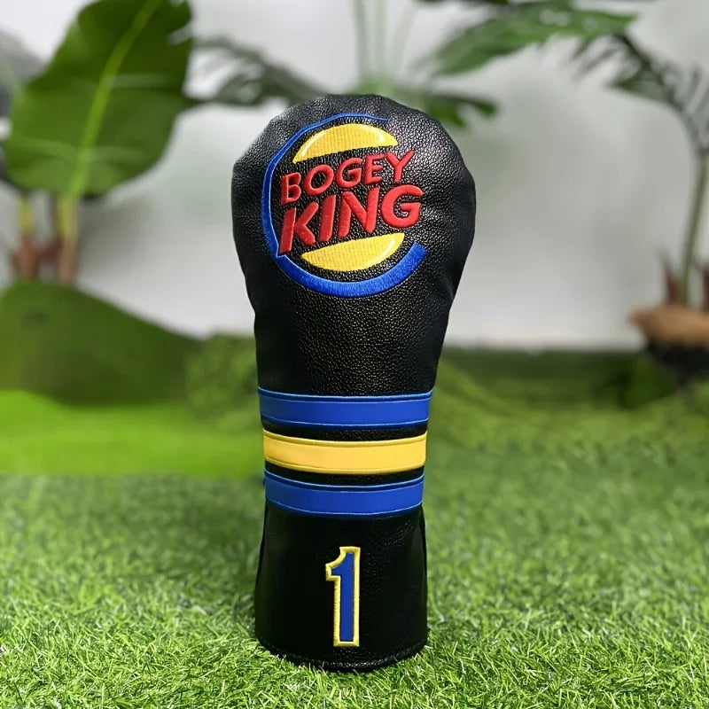 Golf club head cover with 'Bogey King' branding on a grass background