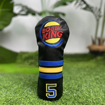 Golf club head cover with 'Bogey King' branding on a grass background
