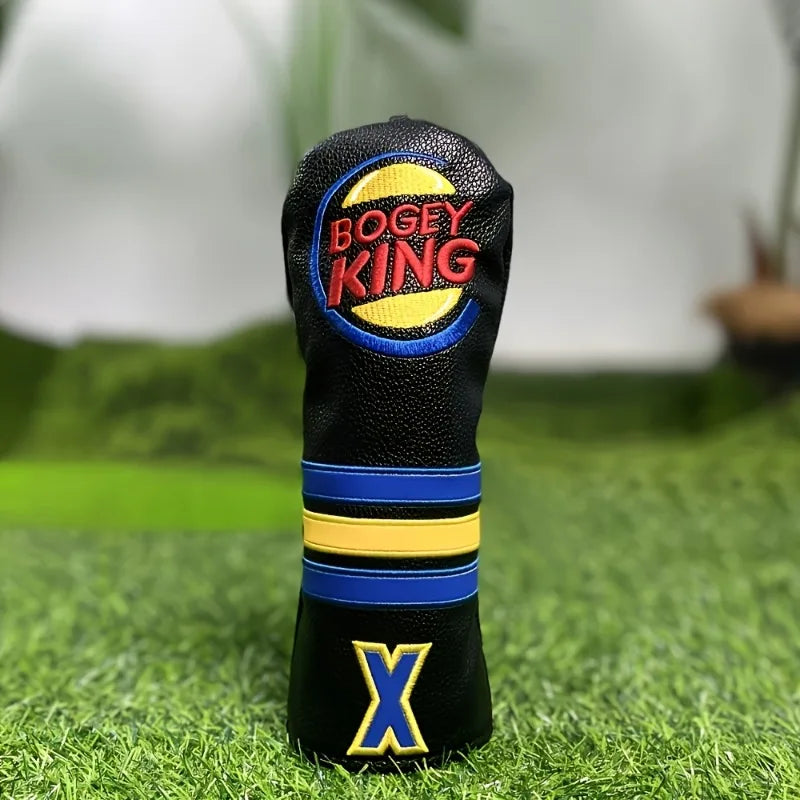 Golf club head cover with 'Bogey King' branding on a grass background