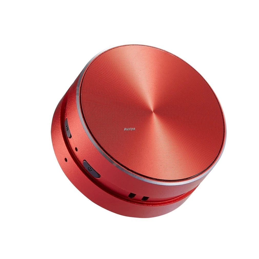 Red cylindrical speaker on a white background