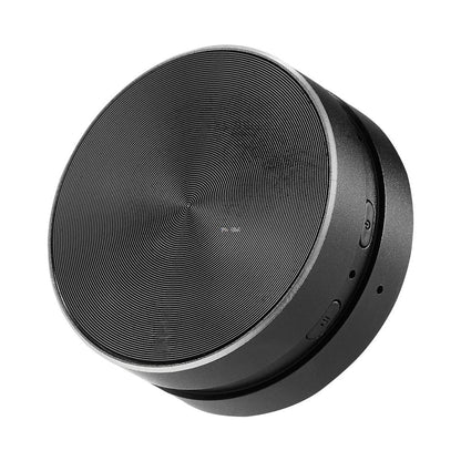 Black round speaker on a white background