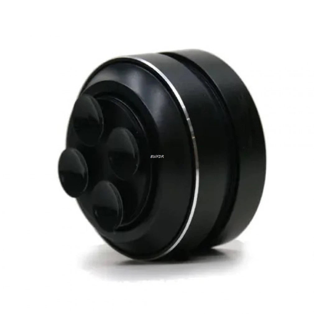 Black cylindrical object with a textured surface on a white background