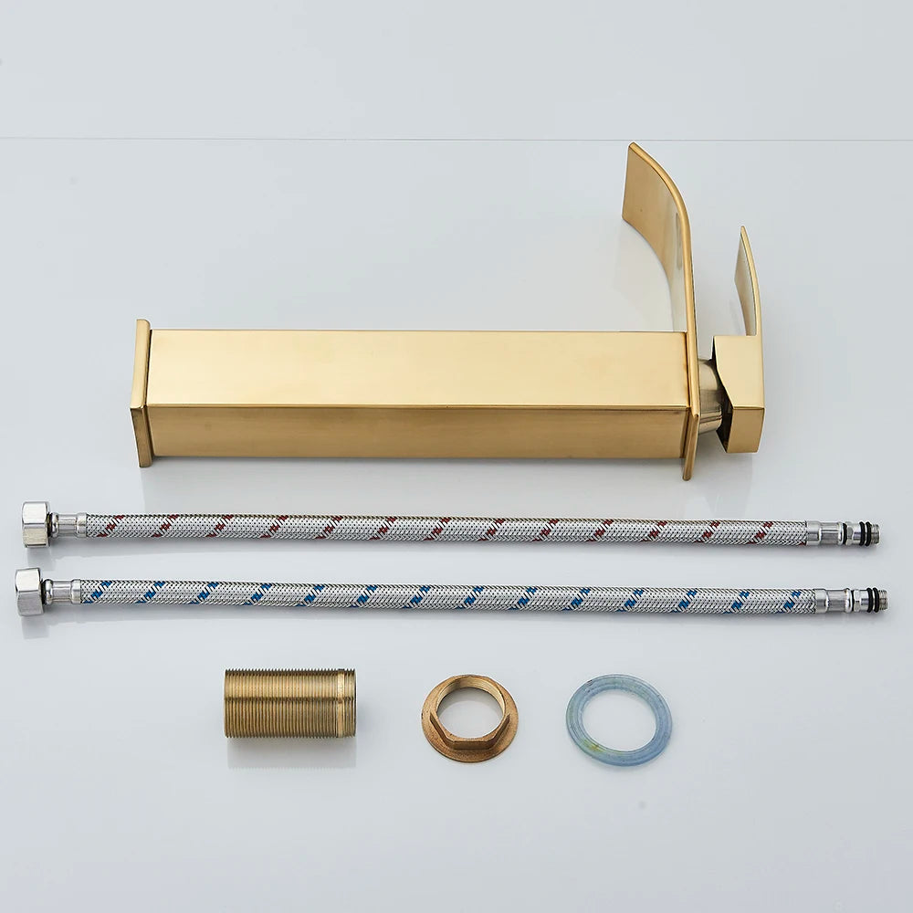 Gold shower head and flexible hose with connectors on a light gray background