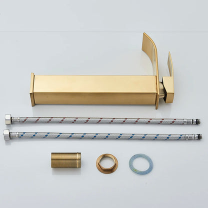 Gold shower head and flexible hose with connectors on a light gray background