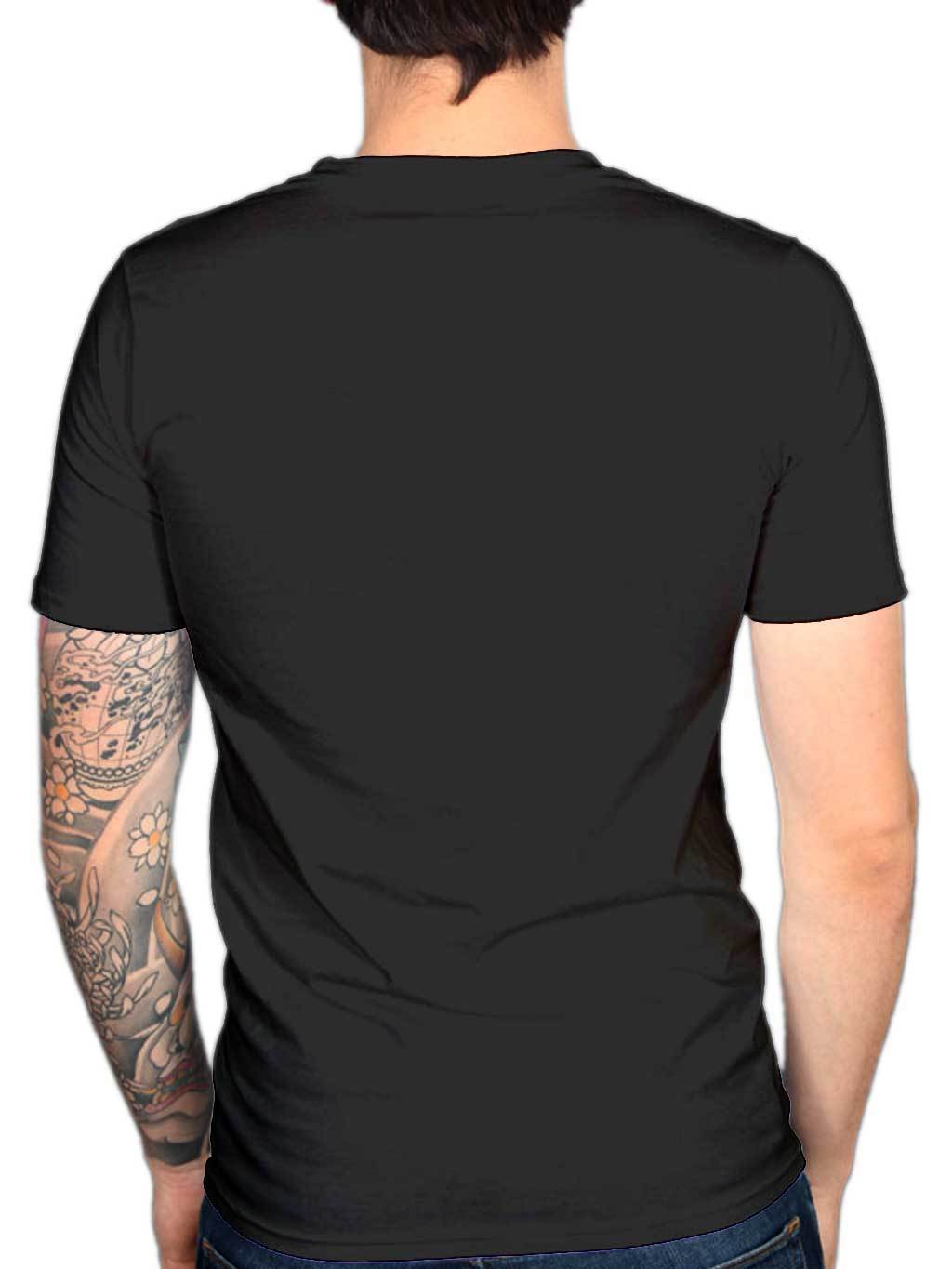 Person wearing a black t-shirt with visible tattoos on arms