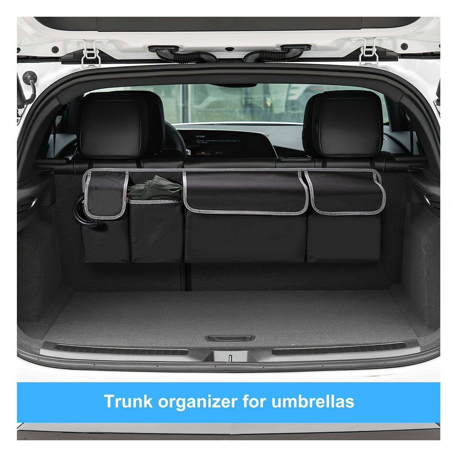 Trunk organizer for umbrellas installed in a car trunk.