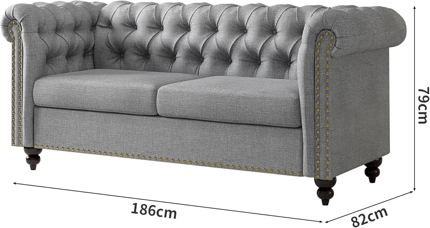 Gray tufted sofa with dimensions on a white background