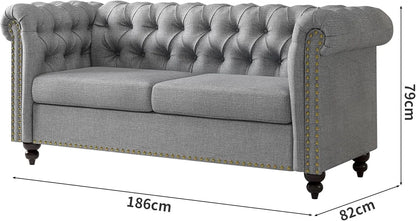 Gray tufted sofa with dimensions on a white background
