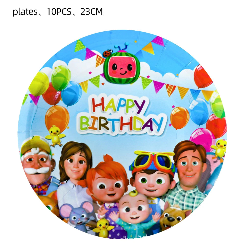 Round Cocomice-themed birthday party plates with colorful cartoon characters, balloons, bunting, and a blue sky background, shown on a white background with text reading 'plates, 10PCS, 23CM' at the top.