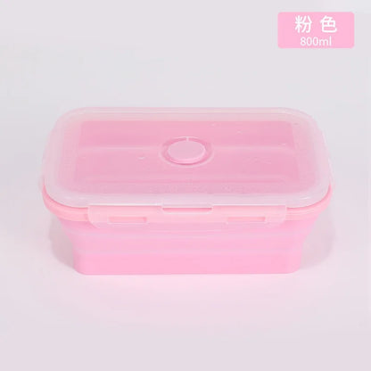 Pink plastic container with a white lid on a light gray background