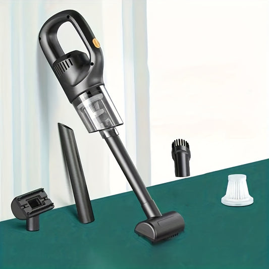 Handheld vacuum cleaner with attachments on a green surface
