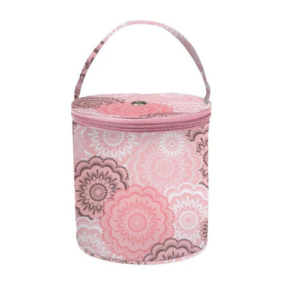 Pink floral patterned cylindrical bag with a handle on a white background