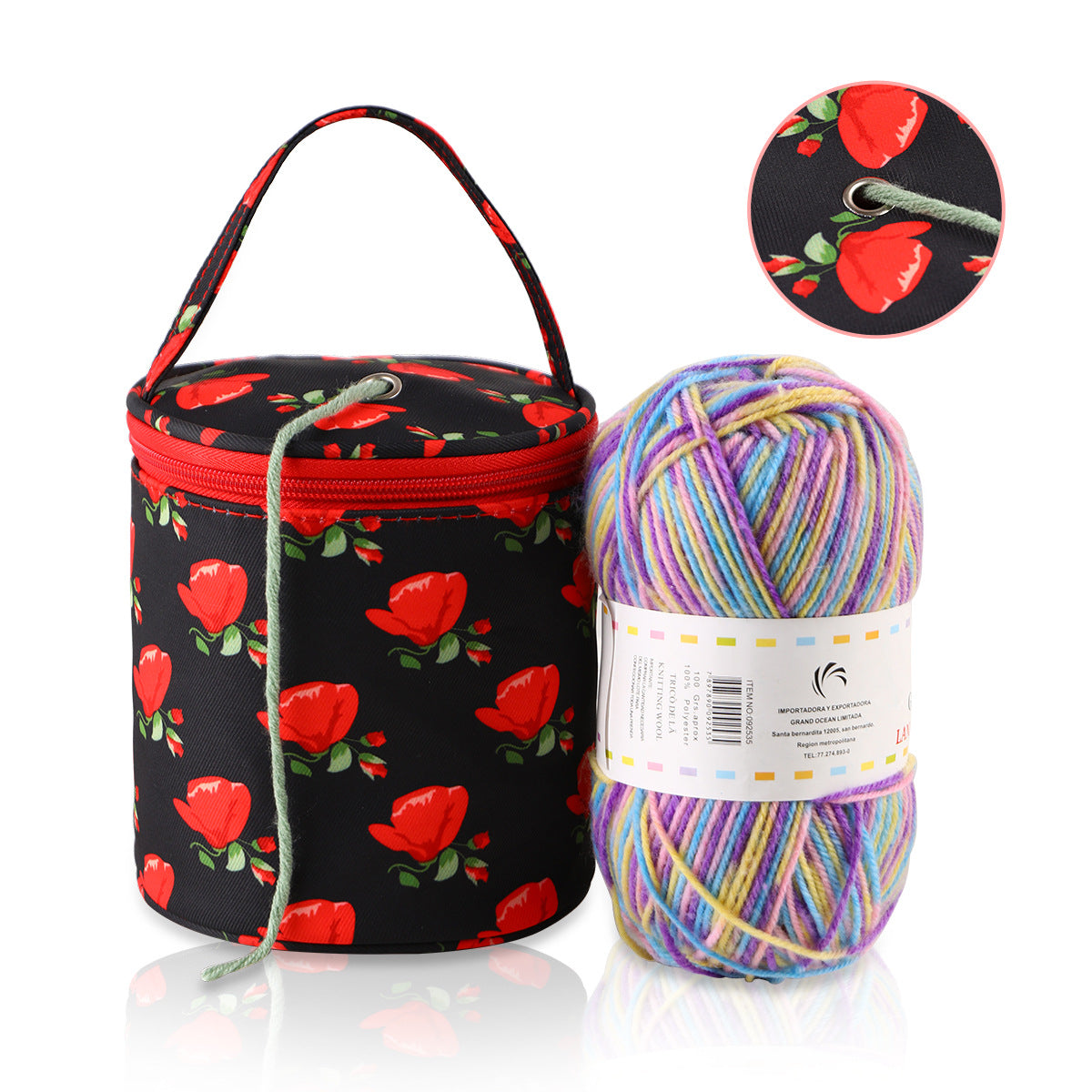 Yarn storage bucket with red floral pattern and a ball of multicolored yarn on a white background