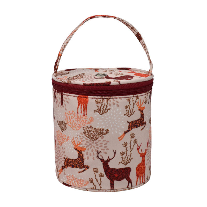  cylindrical fabric basket with deer pattern on a white background