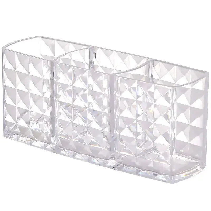 Clear glass rectangular vase with diamond pattern on a white background