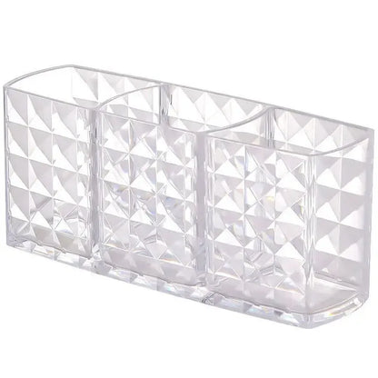 Clear glass rectangular vase with diamond pattern on a white background