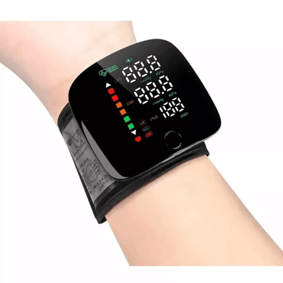 Black digital wristband on a wrist with a white background
