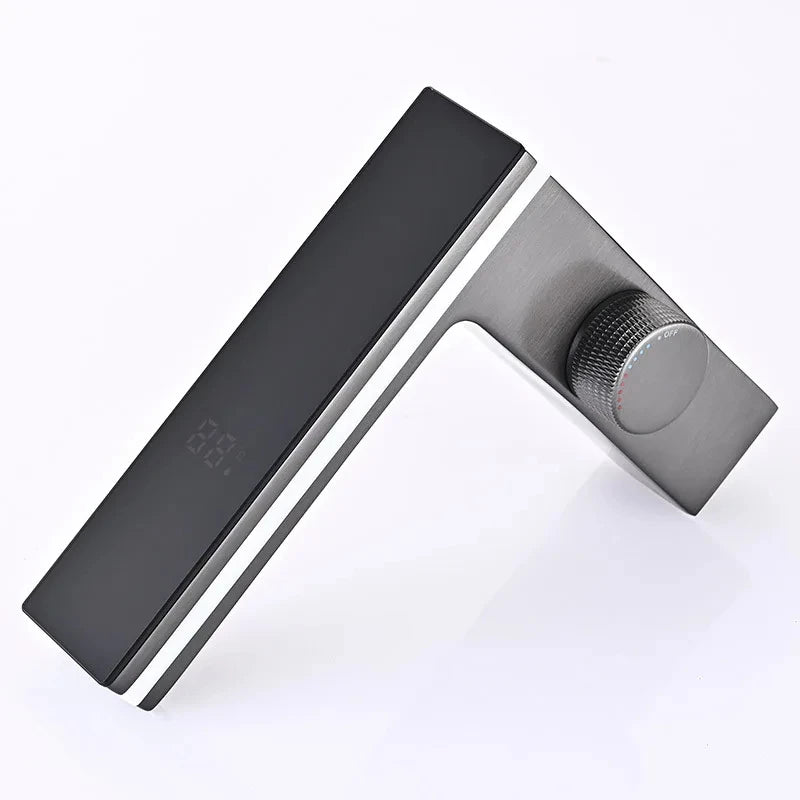Modern door handle with black finish on a white background