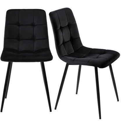 Two black upholstered chairs with quilted design on a white background