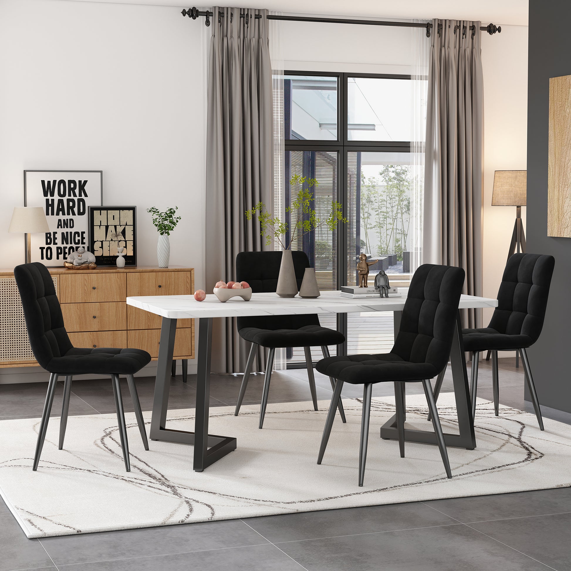 Dining room with a white table and black chairs, large window, and decor elements.