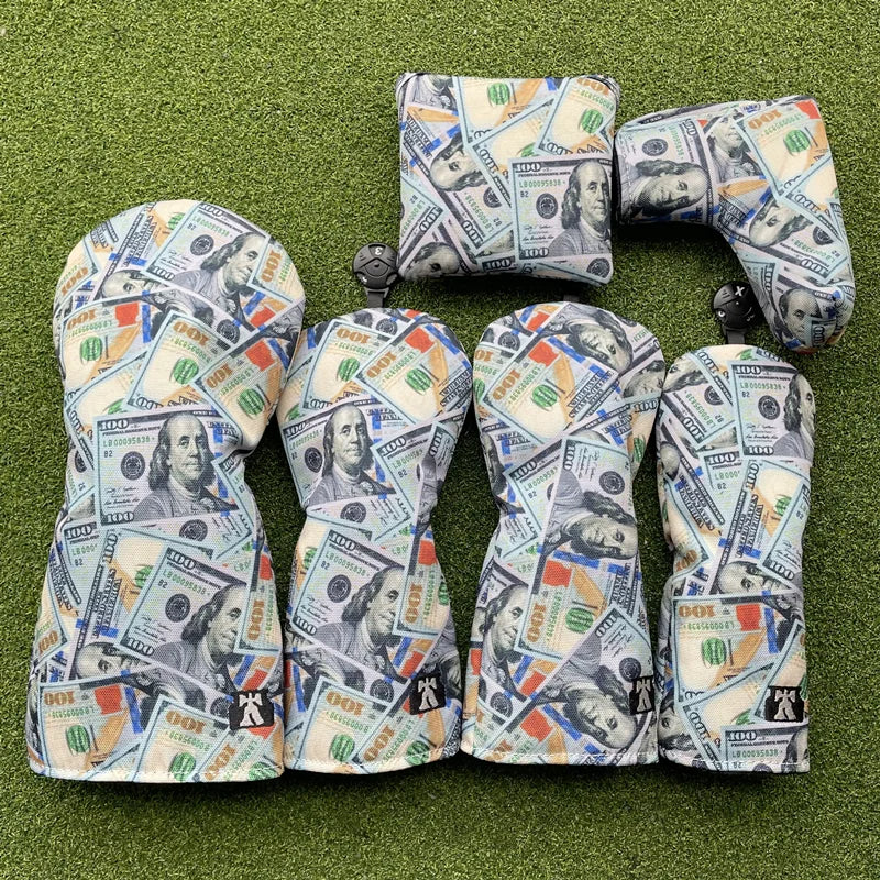 Golf club heads with dollar bill pattern on a green background