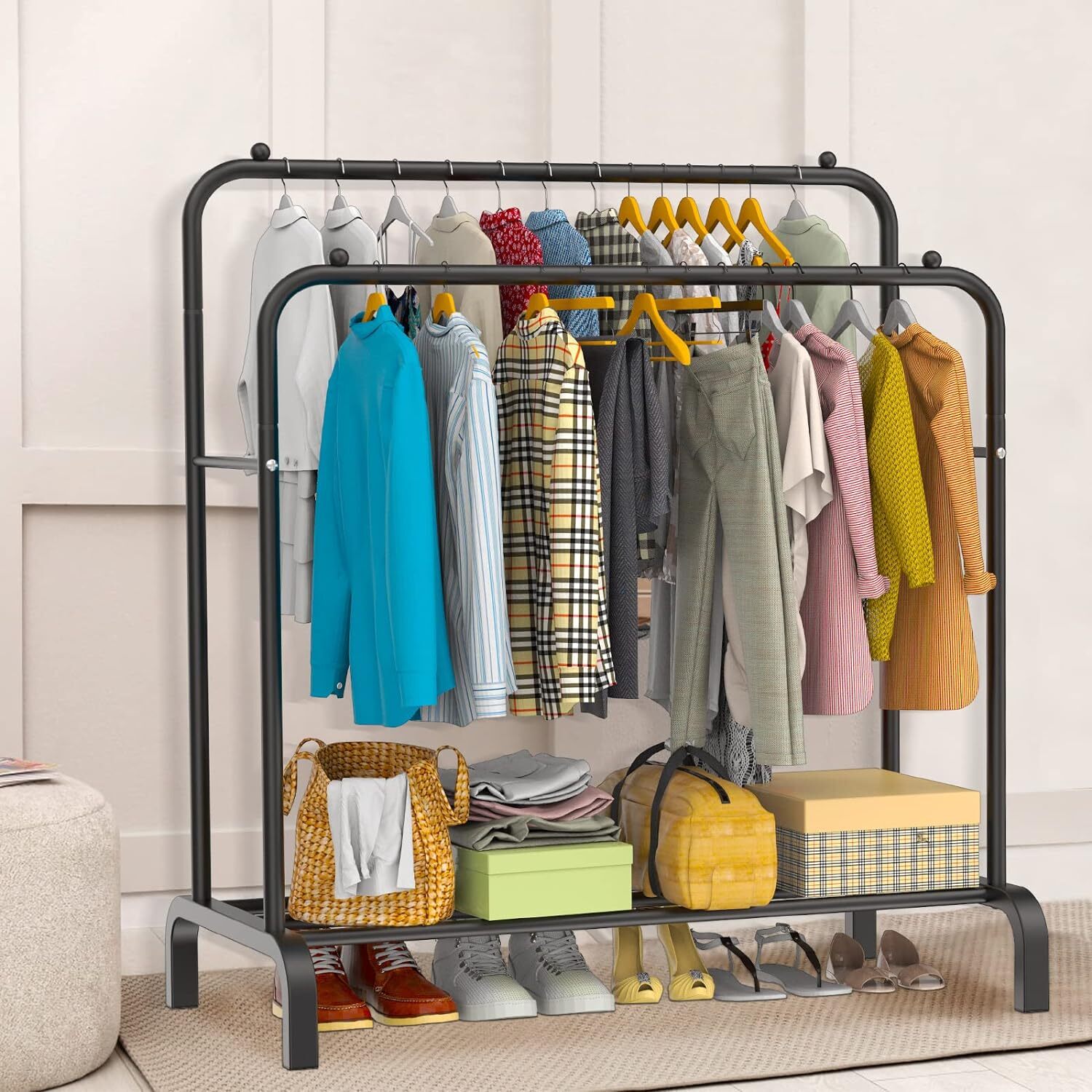 Clothing rack with clothes and shoes on a neutral background