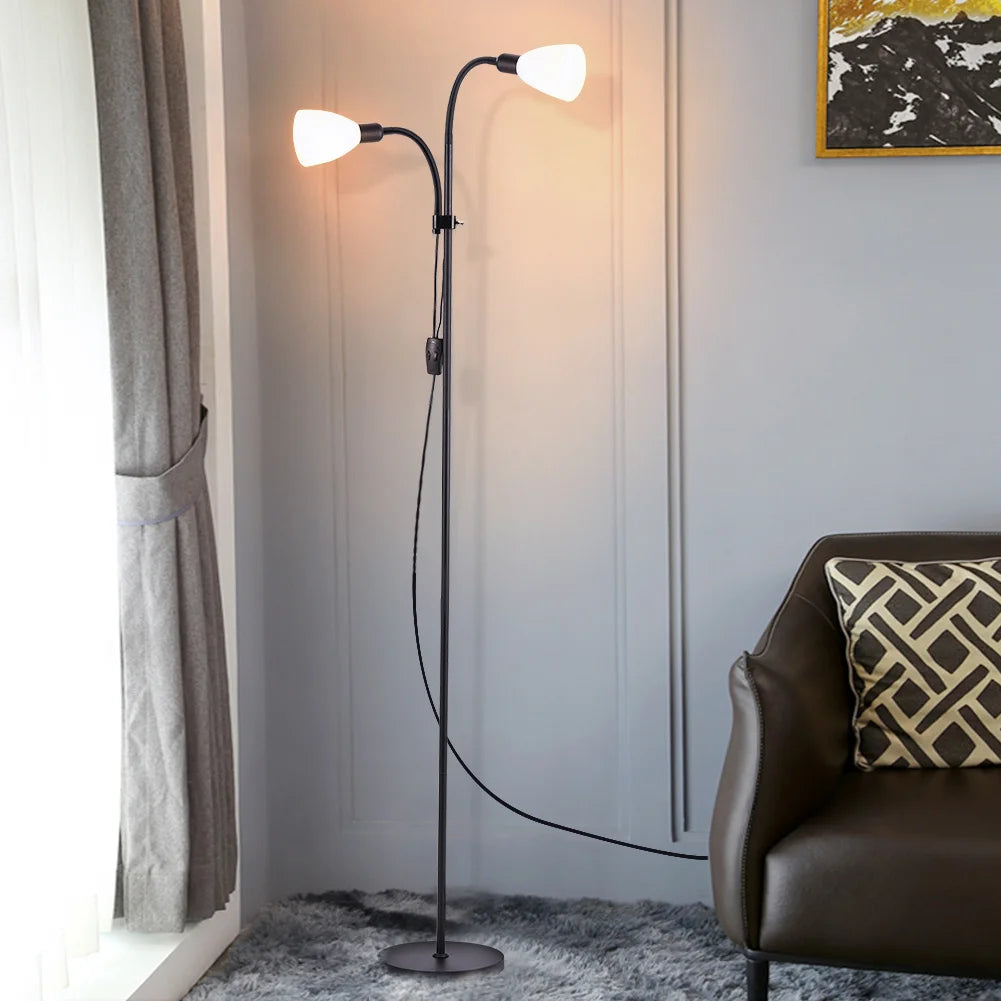 Modern floor lamp with reading light in a living room setting.
