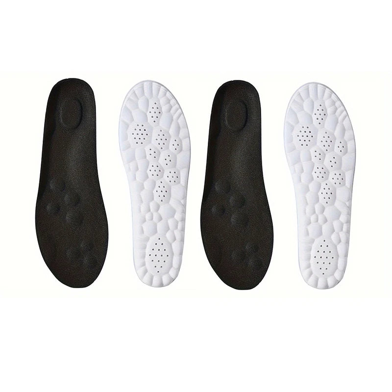 Two pairs of black and white shoe insoles on a white background