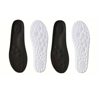 Two pairs of black and white shoe insoles on a white background