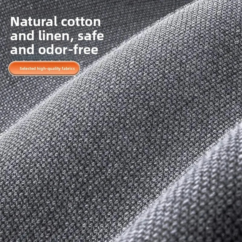 Close-up of gray fabric with text about natural cotton and linen safety.